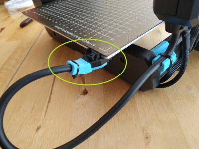 Raised cable strain relief